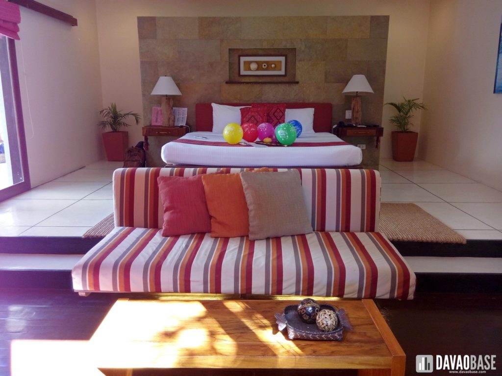 bluewater panglao one bedroom villa king size bed living room