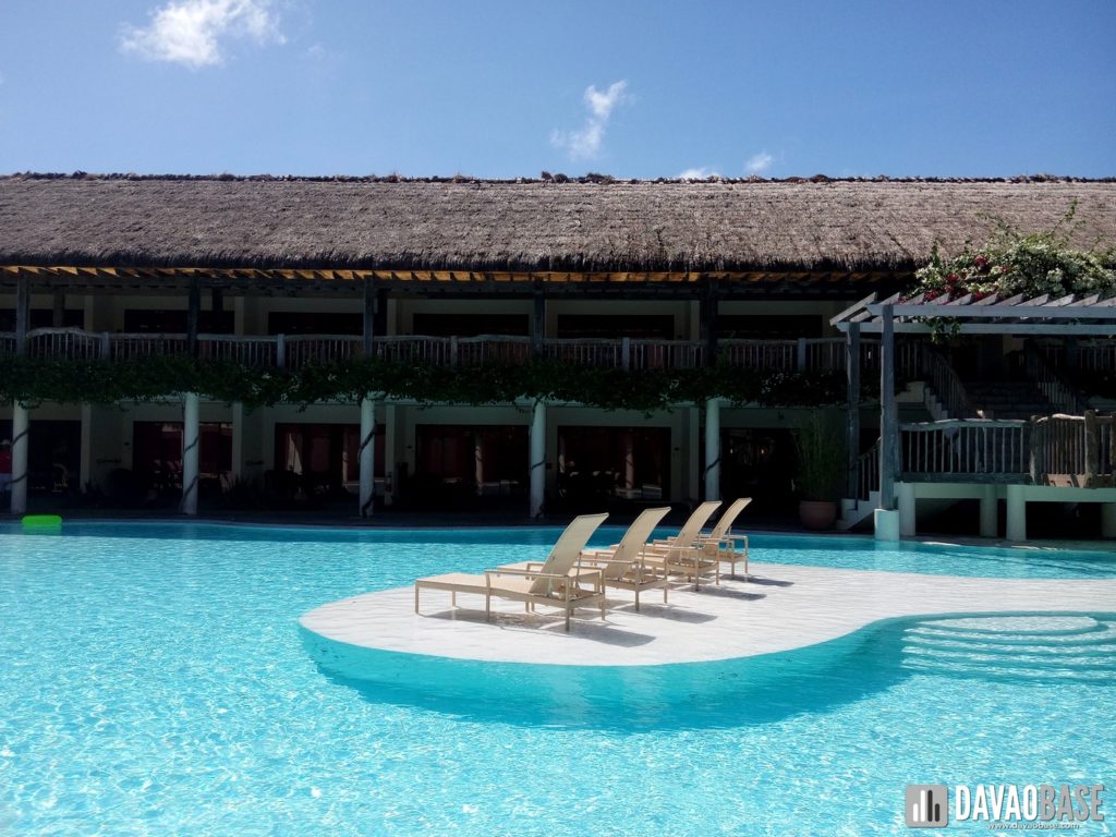 bluewater panglao premier deluxe area swimming pool lounge chairs