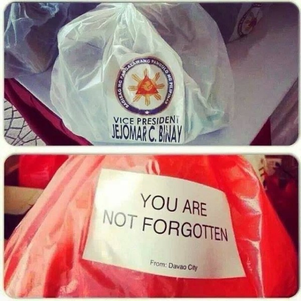 Typhoon Yolanda victims in Tacloban received generic-labeled relief goods from Davao City [Image source: Rocriz Lee]